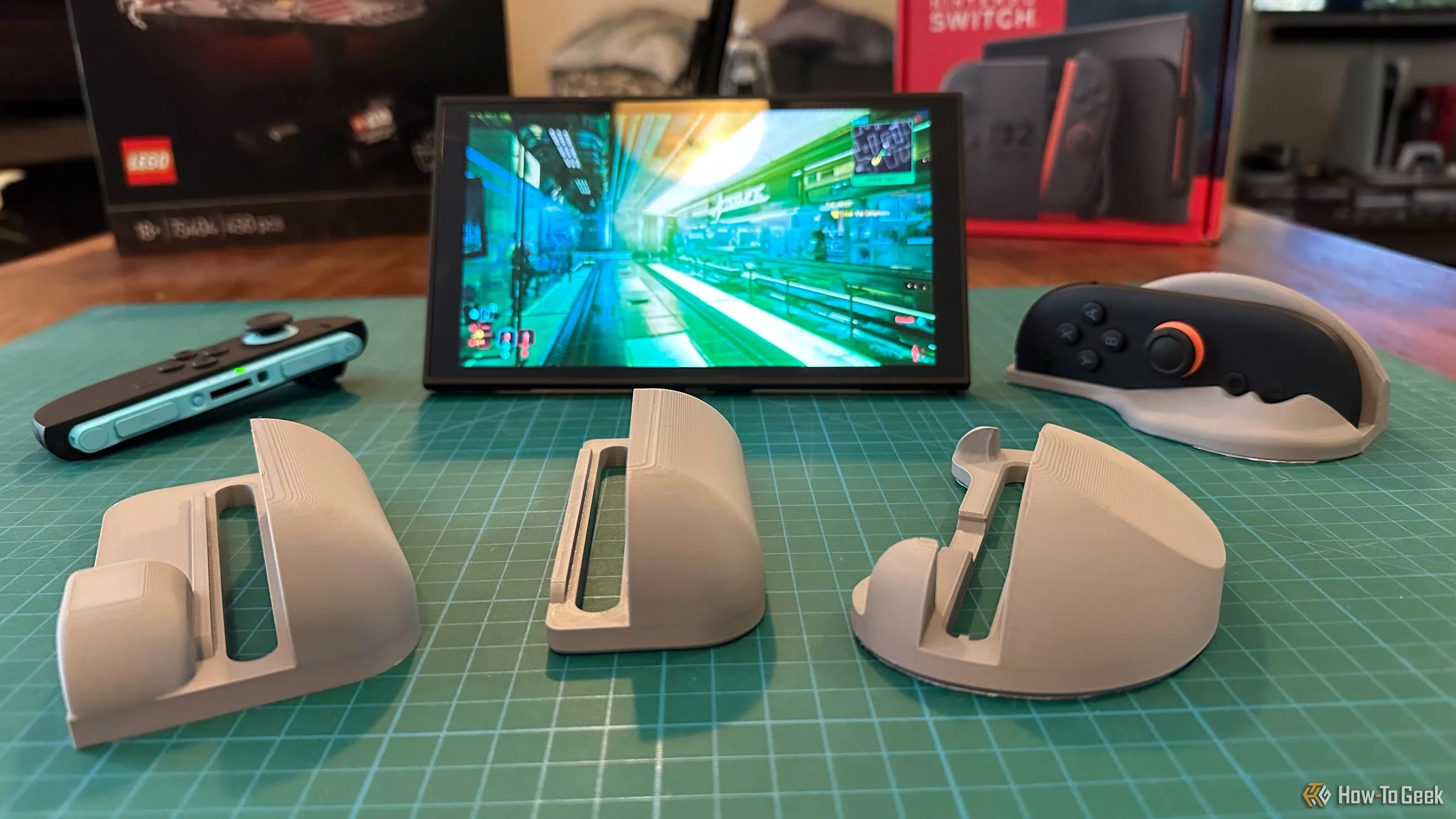 Bộ sưu tập vỏ chuột in 3D đa dạng xung quanh máy chơi game Nintendo Switch 2, thể hiện các giải pháp công thái học sáng tạo cho Joy-Con.