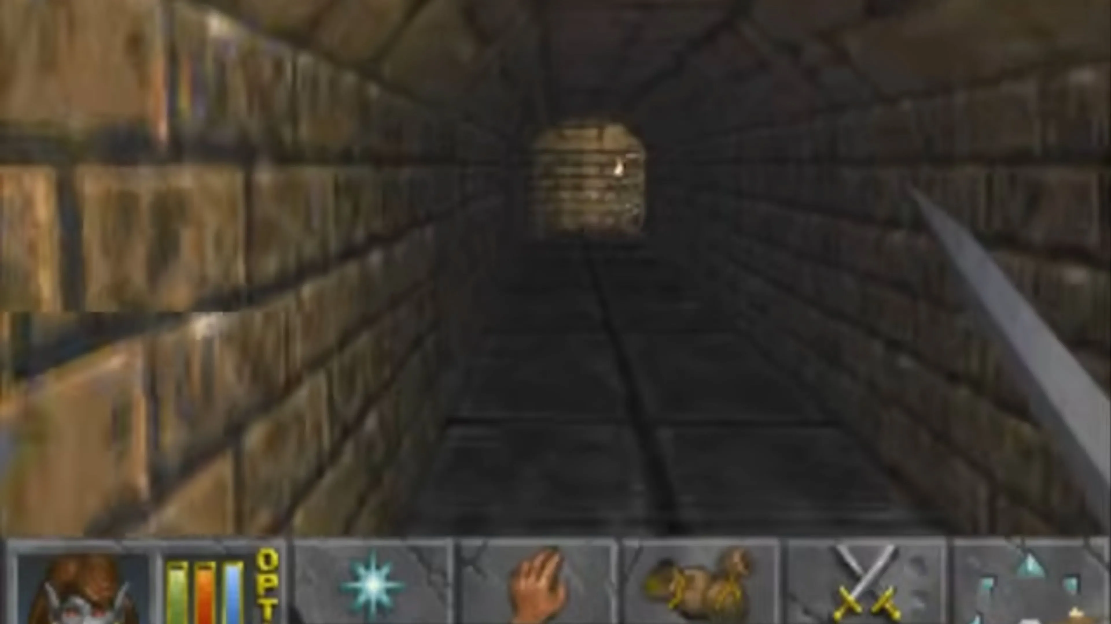 Cảnh khám phá hầm ngục trong The Elder Scrolls II: Daggerfall, thể hiện đồ họa pixel cổ điển và môi trường 3D sớm.
