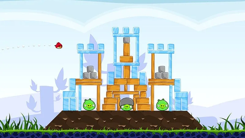 Chim Đỏ Angry Birds đang được bắn ra từ súng cao su, hình ảnh quen thuộc của tựa game giải đố vật lý đình đám trên di động.