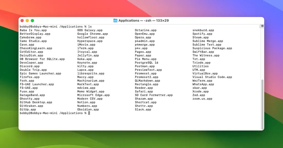 Cửa sổ Terminal trên macOS liệt kê nội dung của thư mục Applications bằng lệnh 'ls', giúp xác định tên ứng dụng.