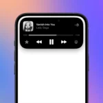 Hình ảnh Dynamic Island trên iPhone hiển thị thông tin nhạc đang phát, cho phép người dùng điều khiển phát/tạm dừng trực tiếp từ khu vực này, minh họa tính năng hoạt động linh hoạt của Đảo Động.