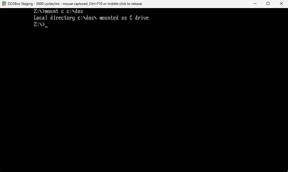 Màn hình DOSBox xác nhận ổ đĩa ảo C: đã được mount thành công tới thư mục C:DOS trên hệ thống Windows của người dùng.