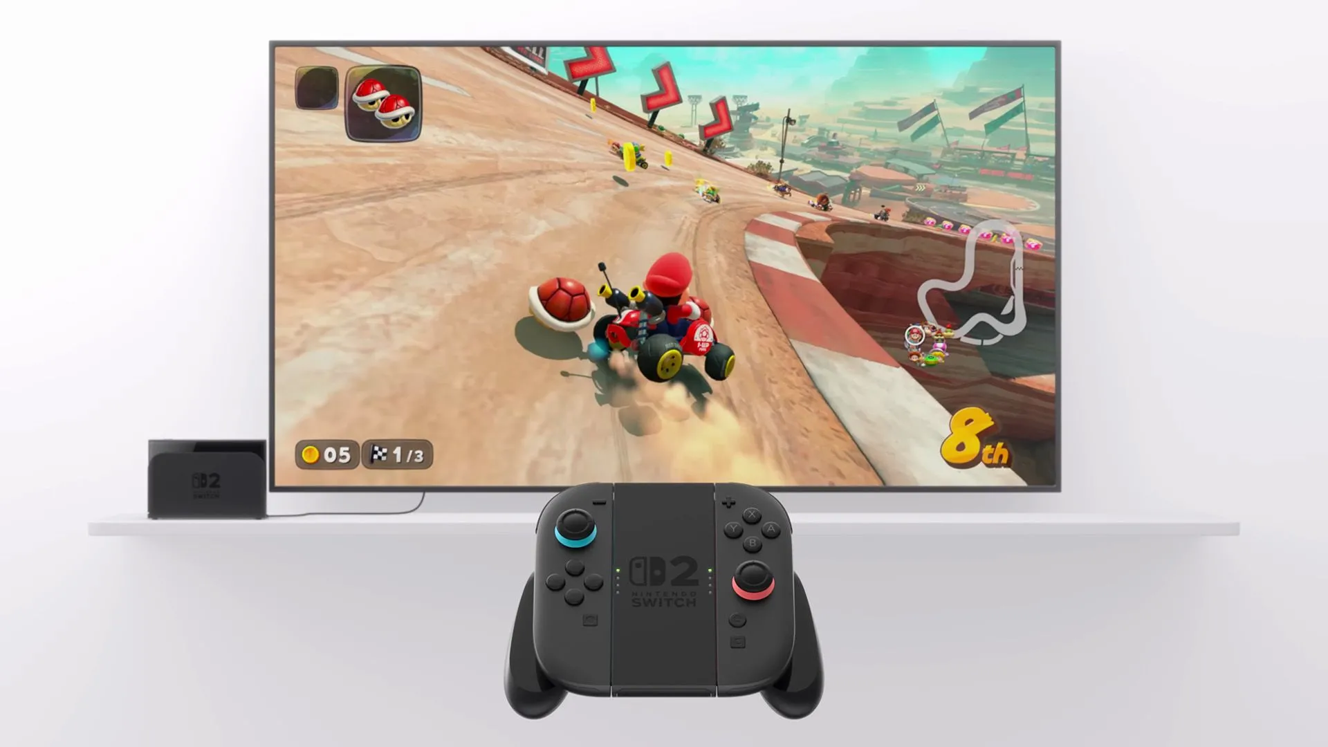 Máy chơi game Nintendo Switch 2 hiển thị trò Mario Kart trên TV, kèm theo bộ tay cầm Joy-Con 2 thế hệ mới, minh họa cho trải nghiệm chơi game nâng cấp trên Switch 2.
