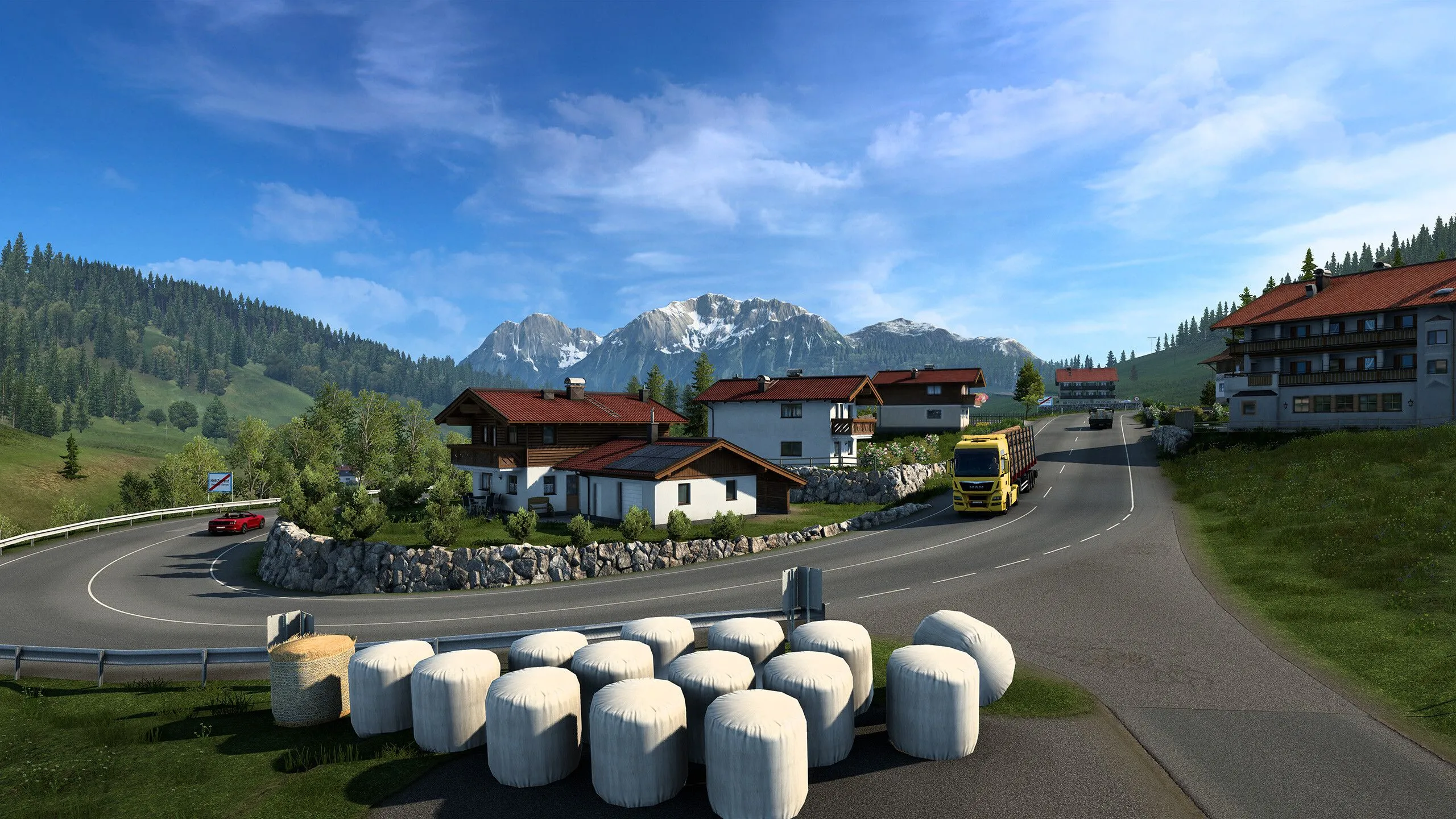 Một khung cảnh lái xe tải trên đường cao tốc châu Âu trong Euro Truck Simulator 2, thể hiện đồ họa mô phỏng cảnh quan đường phố và môi trường giao thông chân thực.