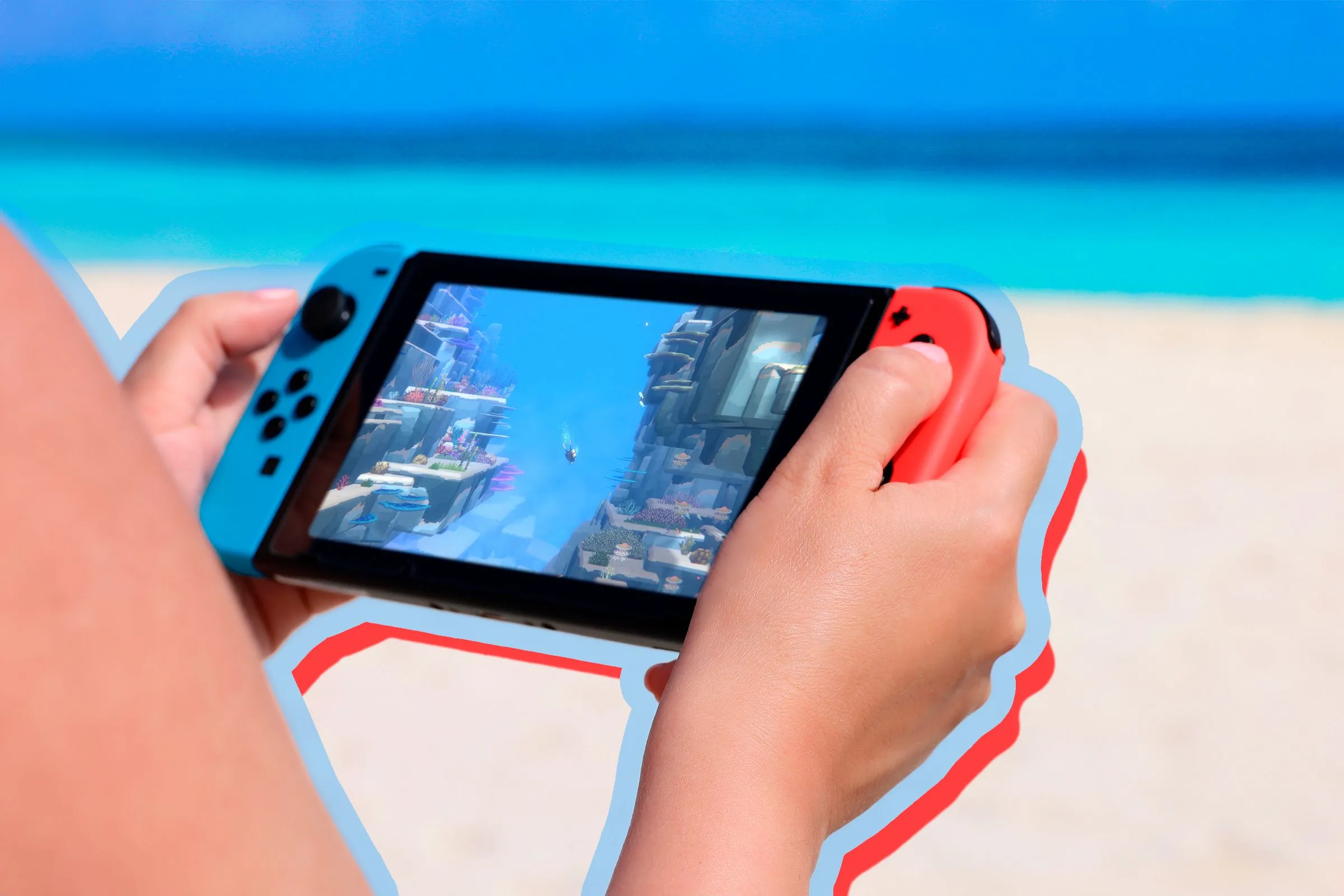 Người đang chơi game trên máy Nintendo Switch tại bãi biển, bất chấp việc Nintendo Switch Online đã gỡ bỏ một số tựa game cổ điển.