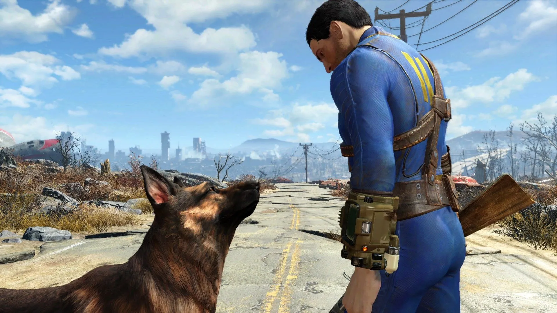 Nhân vật Nate cùng chú chó Dogmeat đi trên con đường đổ nát của vùng đất hoang Fallout 4, minh họa chuyến đi dài trong game được làm phong phú hơn nhờ đài phát thanh.
