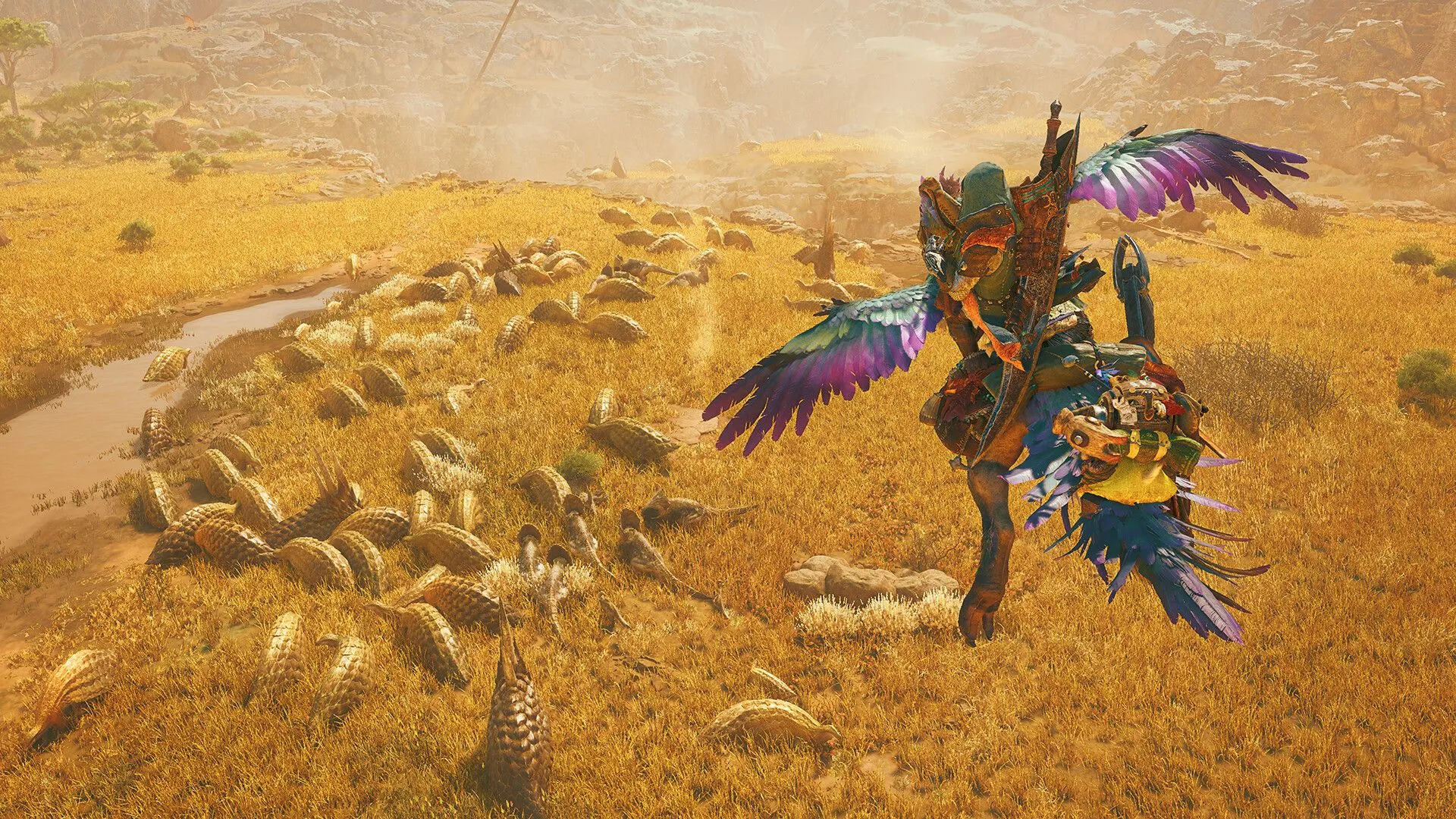 Thợ săn đang đối mặt với một quái vật lớn trong khung cảnh sa mạc của Monster Hunter Wilds, minh họa trận chiến đầy kịch tính.